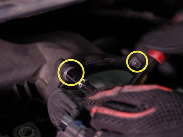 Retirer les deux vis du débitmètre