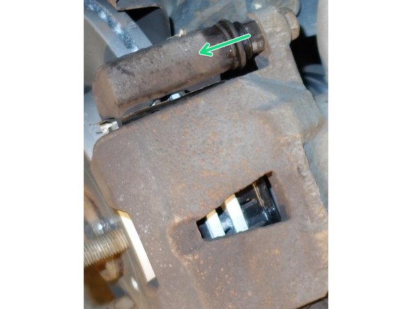 Placer l'étrier sur le support d'étrier.