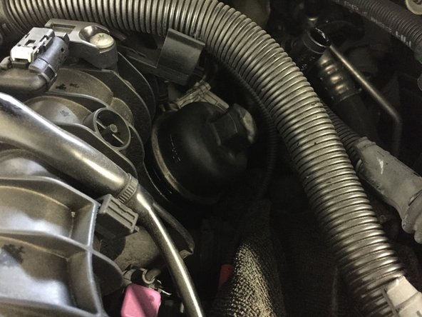 Serrer la à l'aide du cliquet et du la douille de 27