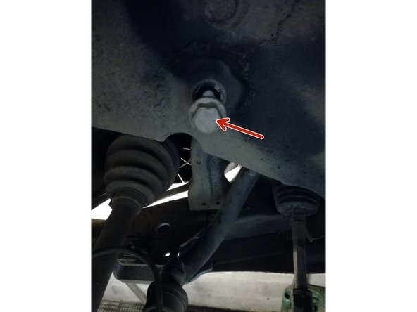 démonter le boulon de 18 et les 3 boulons de 13 ,21 et 18 qui se trouve sous la voiture .quand vous aurez enlevé l'écrou de 21  chasser le boulon avec un chasse goupille avec un marteau