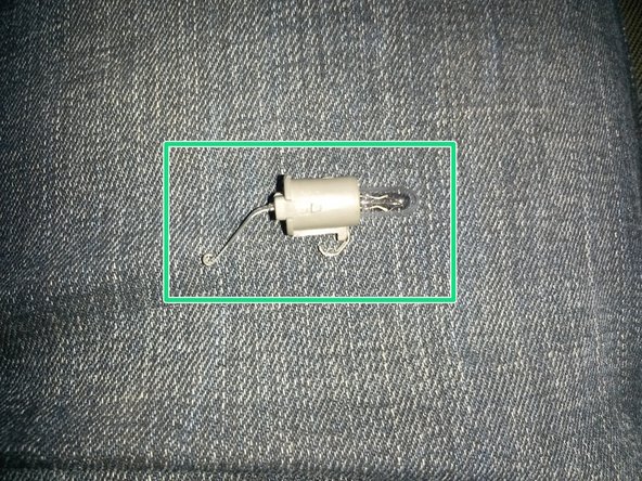 Puis sortir la pièce grise en la déclipsant.