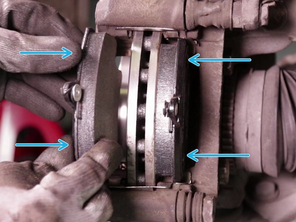 
Position the brake pads
