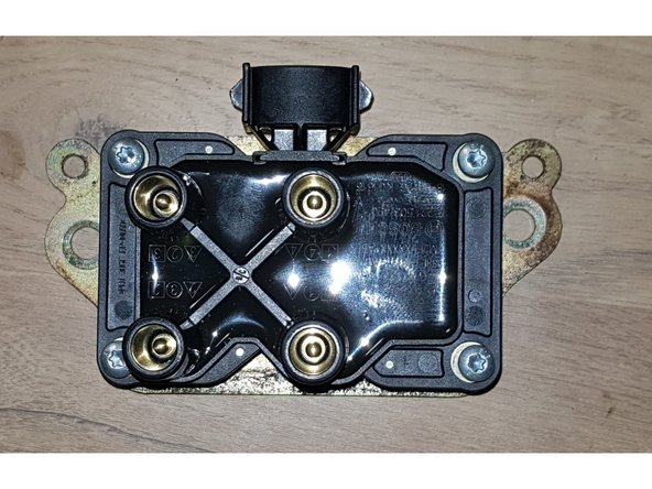 Fixez la bobine neuve sur la platine.