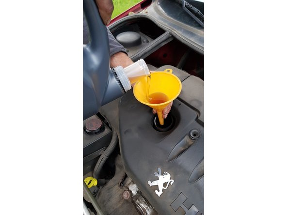 Placez le bouchon neuf avec son joint neuf également.