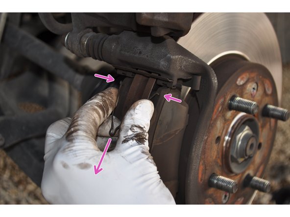 
A retaining spring between the 2 plates. Pinch the ends and remove the .
