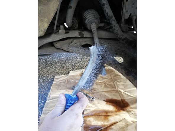 
Brush the threaded shaft using the wire brush
