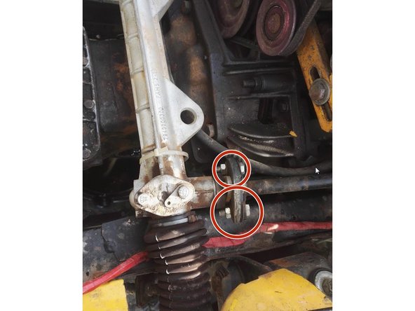 Dévisser les 2 vis de maintiens de la colonne de direction