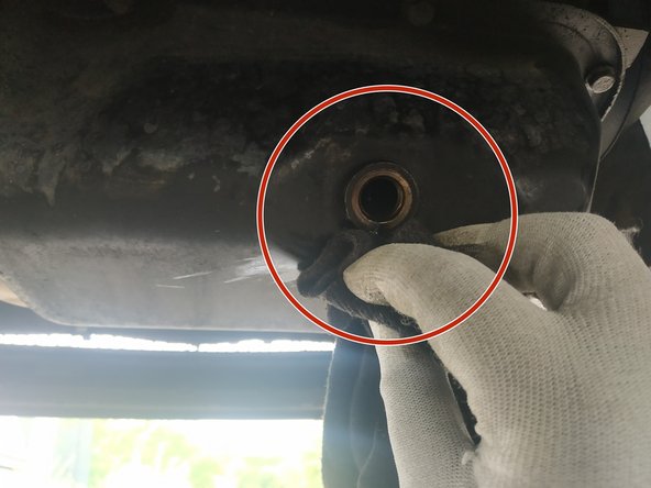 
clean the crankcase with a cloth
