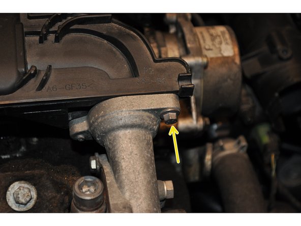 
Remove the 8mm screw between the turbocharger and the air resonator
