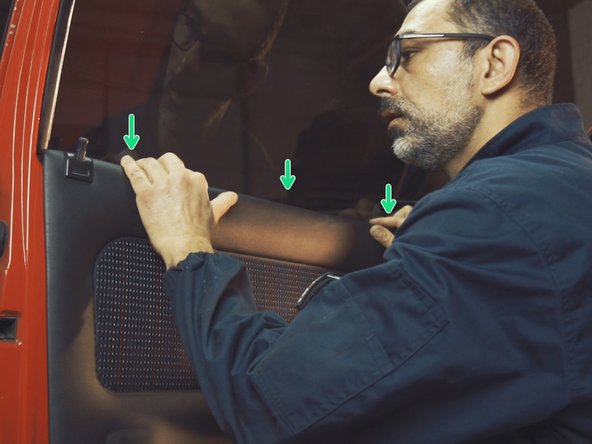 
Snap the top of the door panel into the lips of the top of the door
