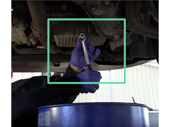 placer un bac sous le carter