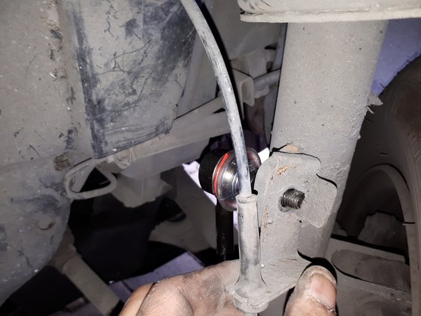 Reposer le support du câble et l'écrou