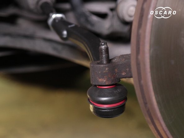 Placer l'écrou sur la rotule