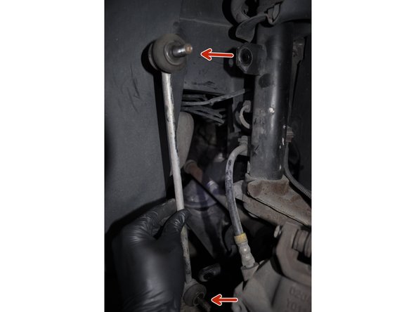 Retirer les 2 axes de la biellette.