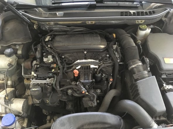 Remettre le cache moteur en le clipsant