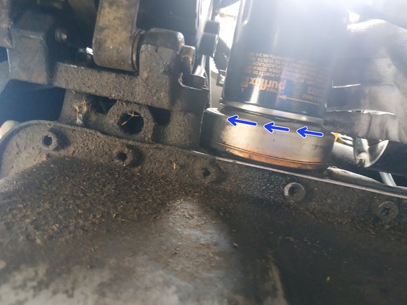 visser le filtre très fort à la main