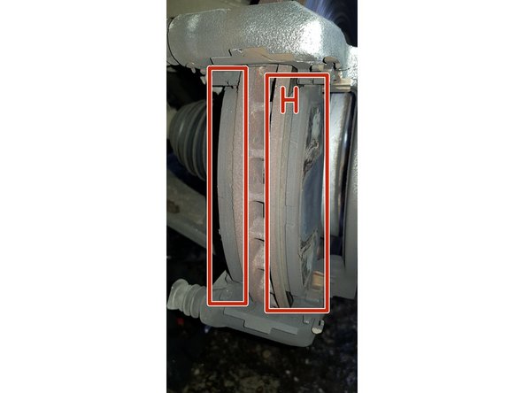 Basculer l'étrier vers le haut. Utiliser un fil ou ficelle pour accrocher l'étrier au crocher disponible.