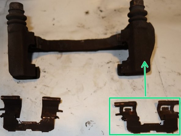 Enlever le support d'étrier.