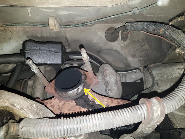 Le joint est resté sur le collecteur avec un tournevis plat retirez-le en faisant levier.