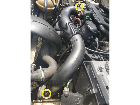 puis dévisser les 2 colliers, clé de 7mm