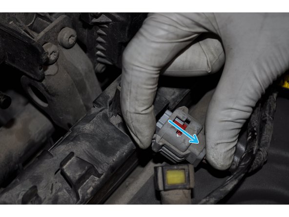 Déconnecter la fiche de la bobine d'allumage.