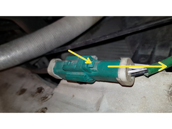 Appuyez sur la languette puis tirez sur le connecteur pour débrancher la sonde.