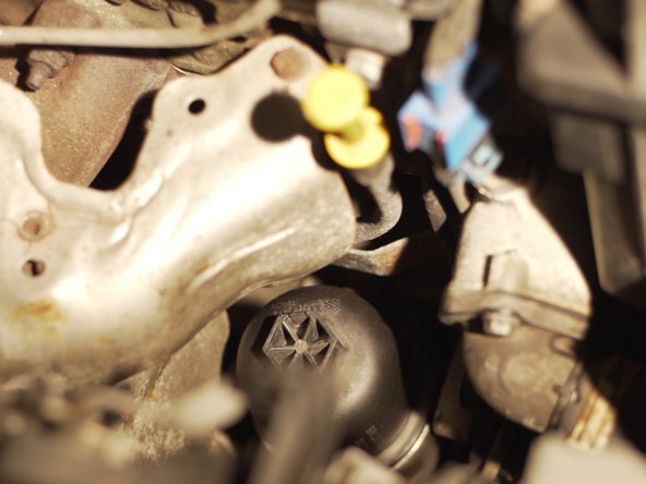 Resserrer la cloche à l'aide du cliquet et de la douille de 27