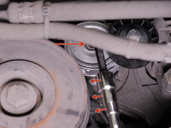 Resserrer la vis du galet avec la clé allen de 8