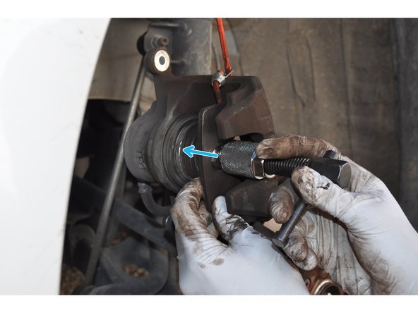 
Use a piston pusher to be able to put the caliper on the new brake pads.
