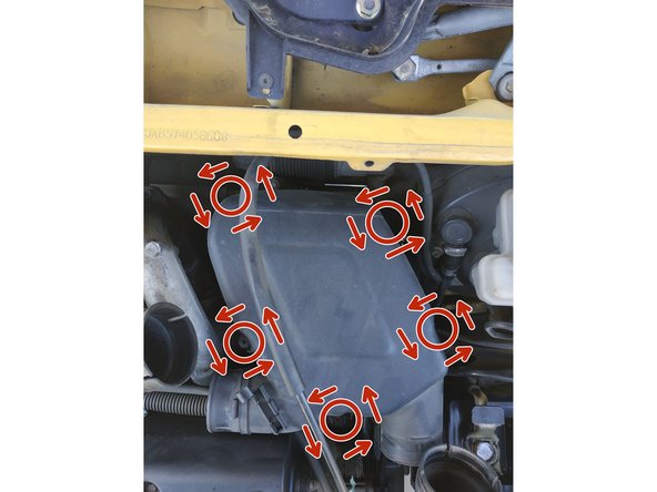 dévisser toutes les vis qui maintiennent la coiffe en place à l'aide d'un tournevis cruciforme