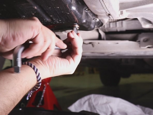 Resserrer-le à l'aide du carré de vidange