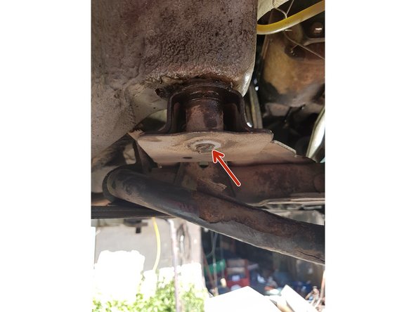 ATTENTION: Pour cela enlever la vis métallique qui servait de blocage et qui a cassé car vous ne pourrez pas mettre votre clé correctement sur l'écrou !