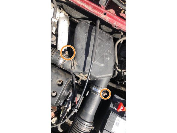 
Re-fit the two intake hoses
