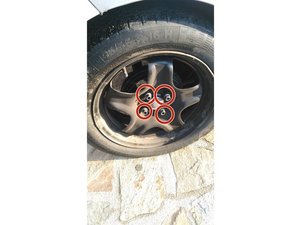 Repositionner la roue et remettre en place les vis