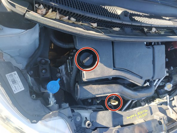 remettre la jauge et le bouchon de remplissage en place