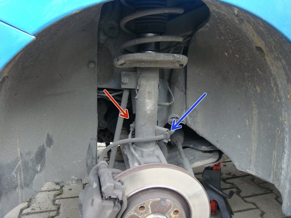 
Unhook the brake hose
