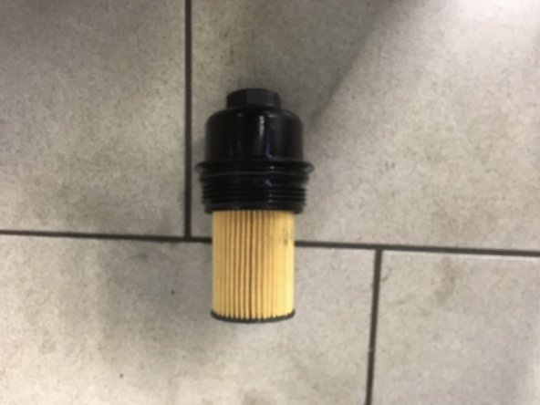 Monter la nouvelle cartouche du filtre en la clipsant vers le bas