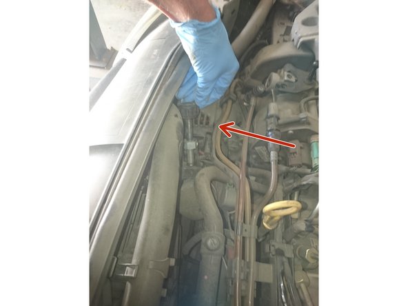 Avec le démonte filtre désserer le filtre dans le sens anti-horaire. photo 1