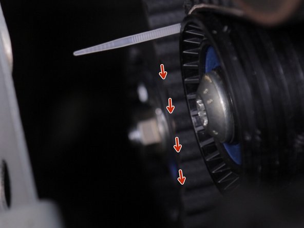 Poser la courroie de distribution sur le galet tendeur