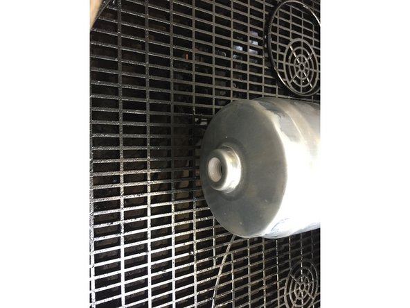 
Tighten it using the strap wrench
