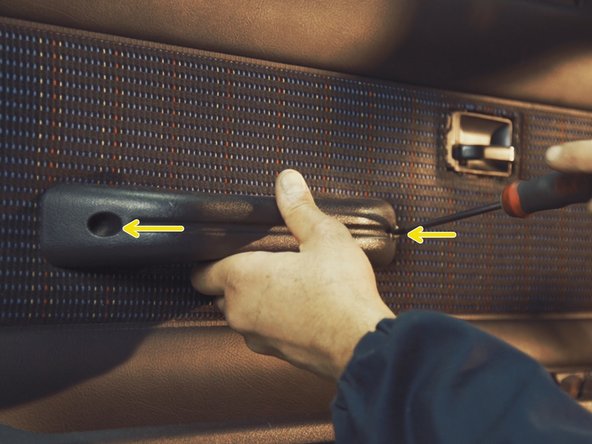 
Replace the armrest and tighten the two screws with a Torx T30
