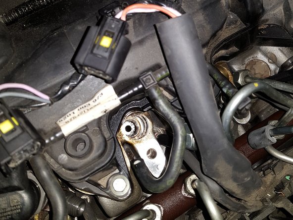 Constater la présence du joint en cuivre sur le bout de l'injecteur, ne rien laisser tomber dans le puit