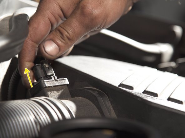 Retirer le débit-mètre en pinçant puis en tirant dessus