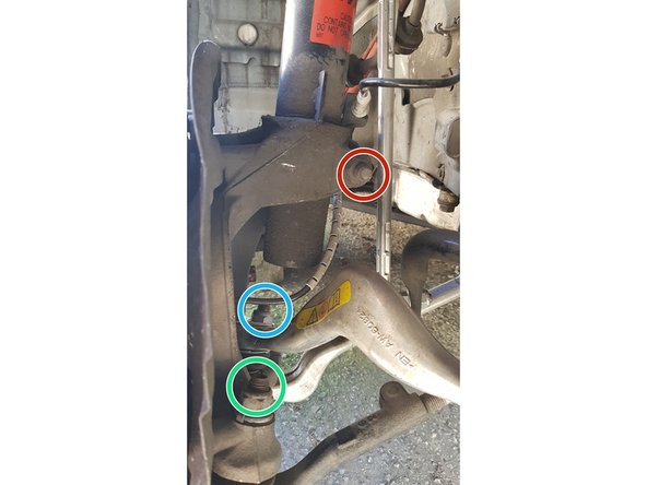 Boulon de maintien de l'amortisseur dans la fusée