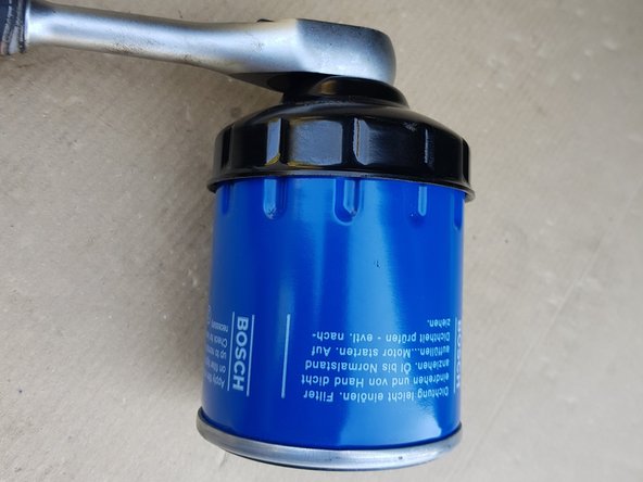 Replacez l'ancien bouchon à sa place.