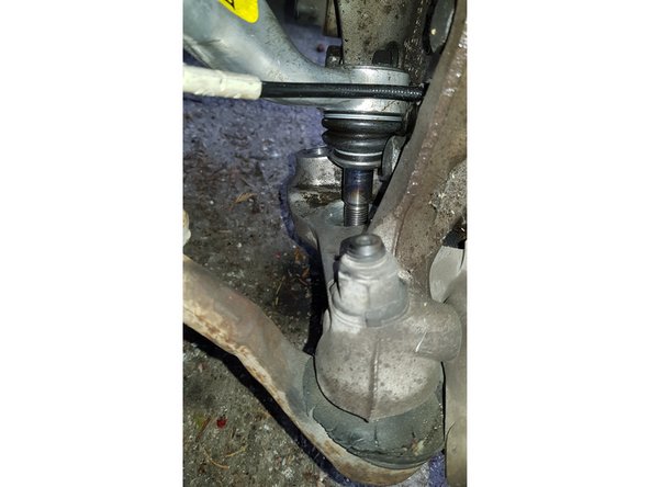 Remplacement du tirant de chasse sur l'essieu avant sur E91