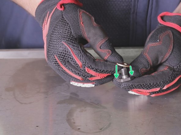 Reposer le nouveau joint sur le bouchon de carter.