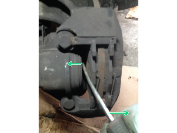 
Push the piston back using a sturdy flathead screwdriver
