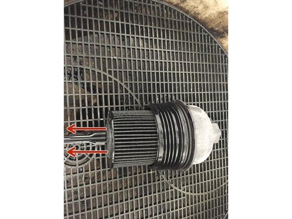 
Remove the oil filter cartridge
