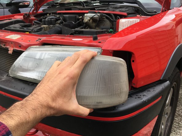 
Be careful not to pull too hard, the light is still connected to the harness
